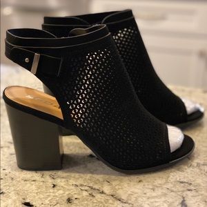 Perforated slingback black booties